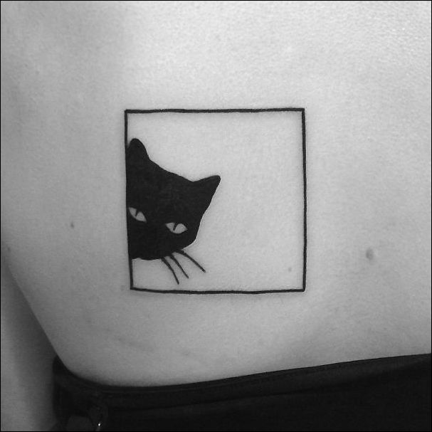 татуировка в виде кошки