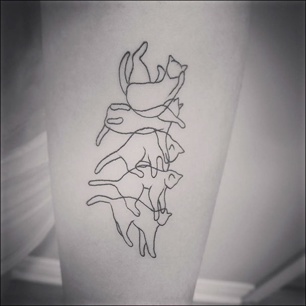 татуировка в виде кошки